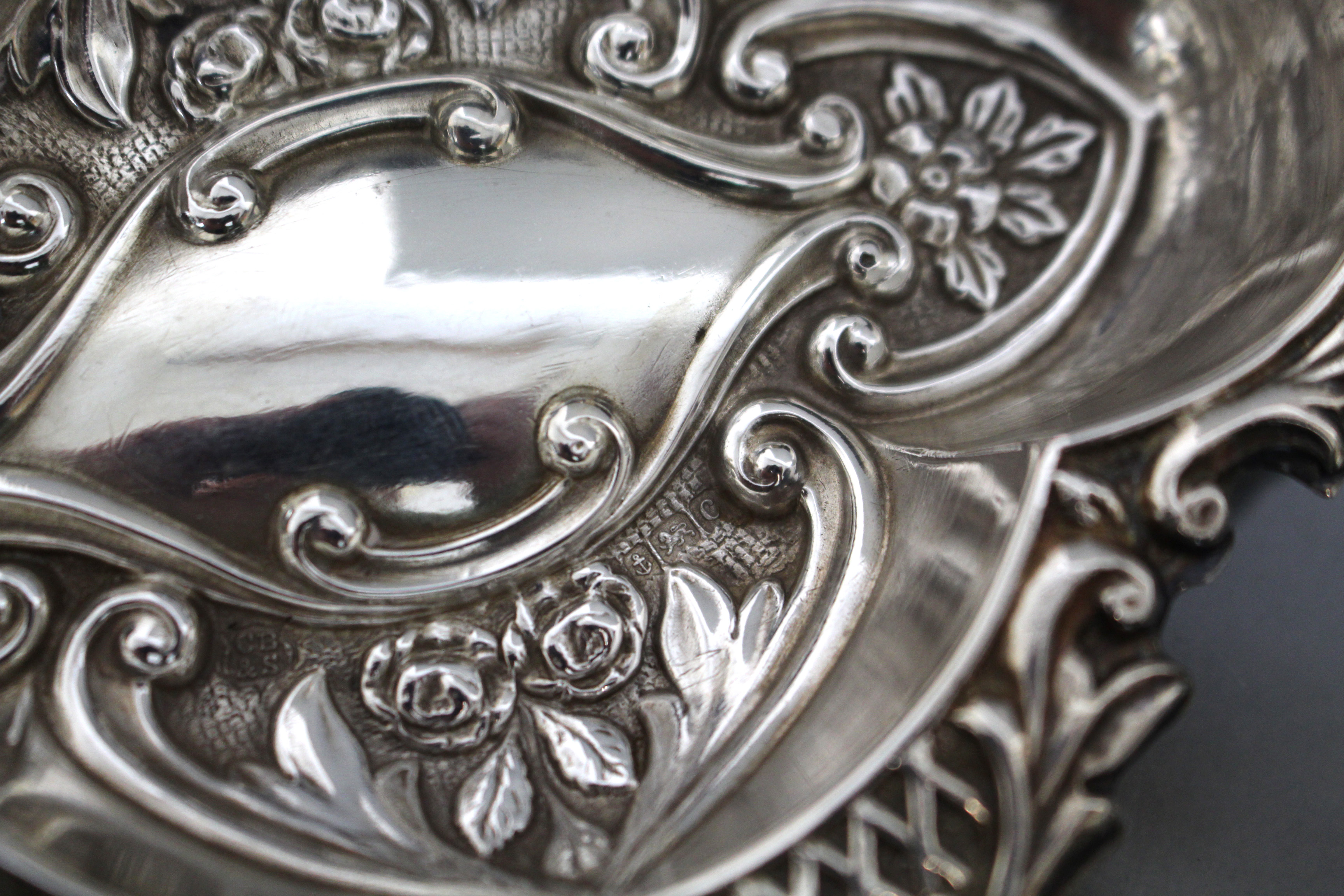 A George V silver quatre-lobe small oval dish with embossed decoration of flowers & scrolls, - Image 5 of 5