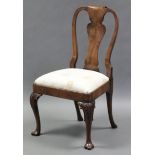 A George I style walnut dining chair with shaped splat back, padded drop-in seat & carved cabriole