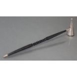 A mid-20th century silver candle snuffer of cone shape with ebonised turned wooden handle, 12“ long;