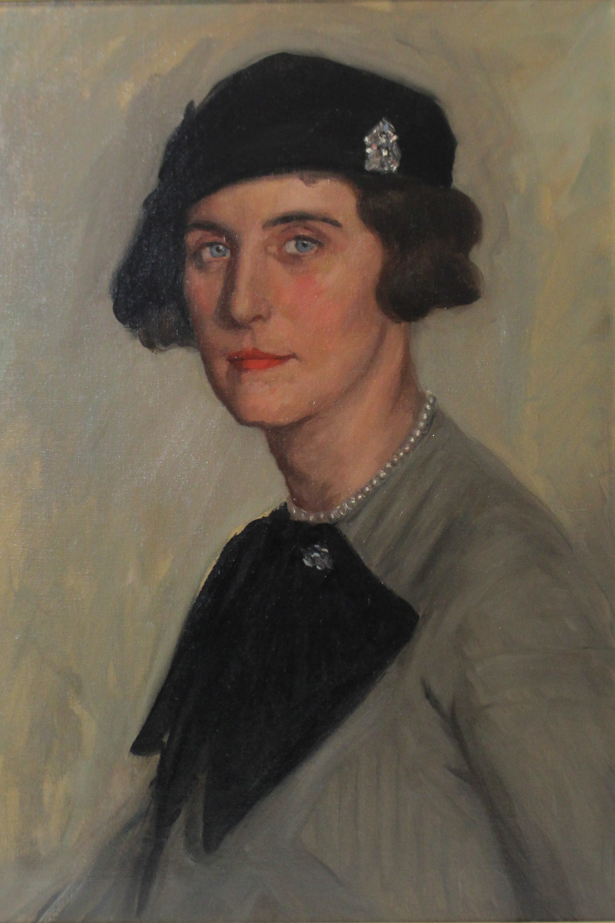 ENGLISH SCHOOL, early 20th century. A head & shoulders portrait of Mrs Stanley Edgson seated,