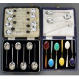 A set of six silver-gilt & harlequin enamel coffee spoons, Birmingham 1974, in fitted case; a set of