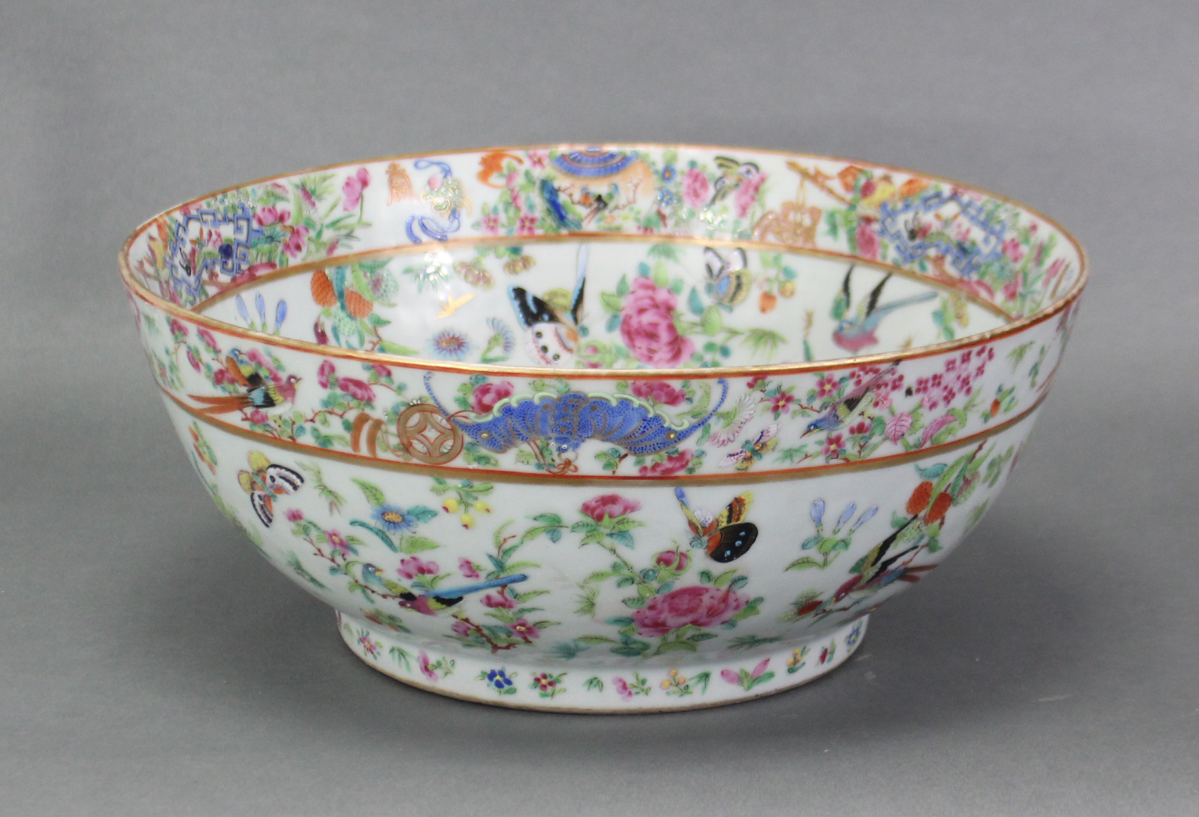 A 19th century Cantonese porcelain punch bowl, of celadon ground & with all-over famille rose - Image 6 of 7