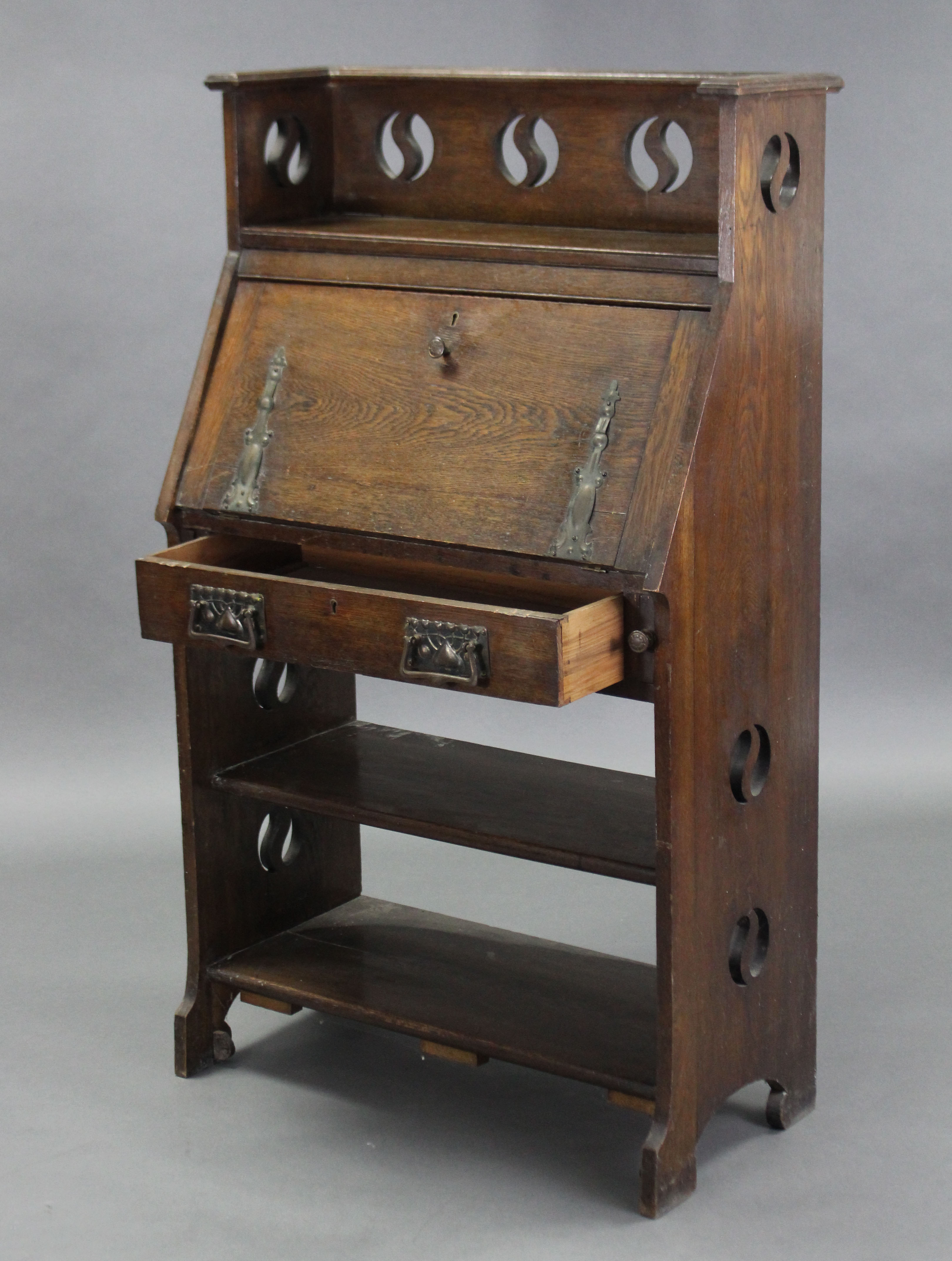 An Arts & Crafts oak upright hall cabinet, with pierced roundels to the tray top & sides, a - Image 6 of 6