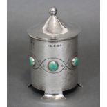 AN EDWARDIAN ARTS & CRAFTS SILVER POT & COVER , the cylindrical body with planished surface, inset