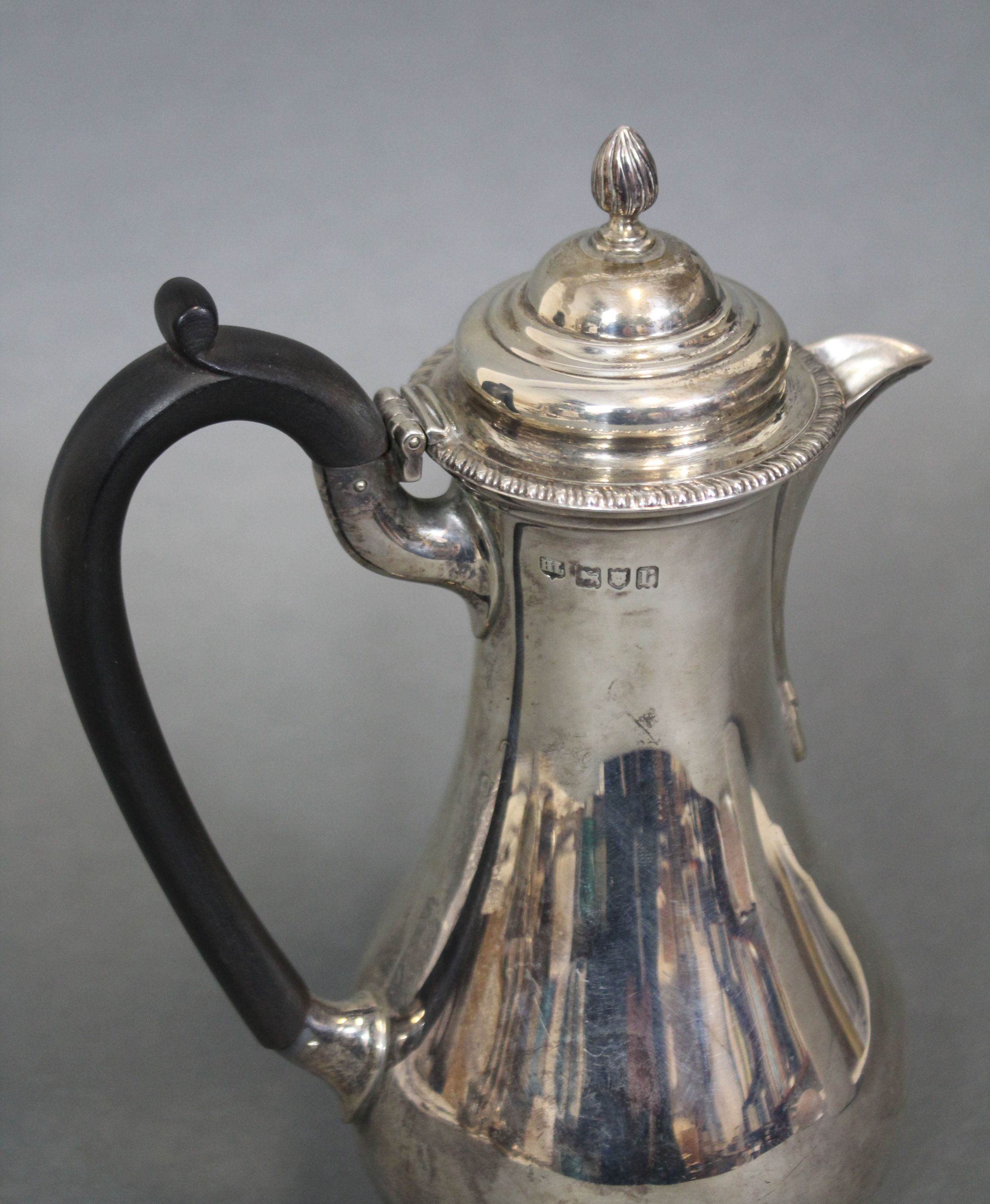 An 18th century-style hot water jug of baluster shape with ebonised scroll handle, hinged lid & on - Image 2 of 3