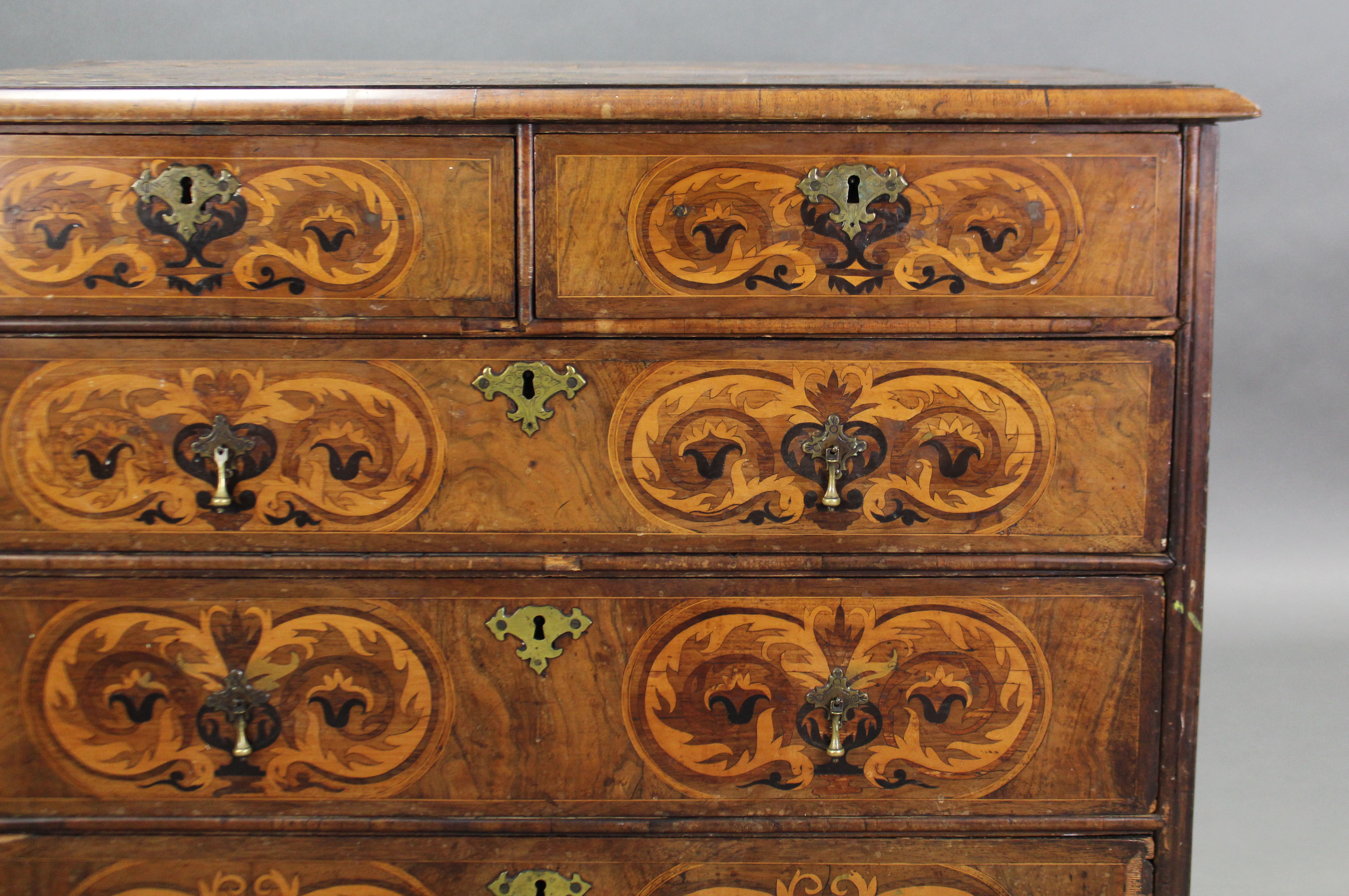 A WILLIAM & MARY WALNUT-VENEERED MARQUETRY CHEST, the quarter-veneered top with moulded edge & - Image 7 of 7