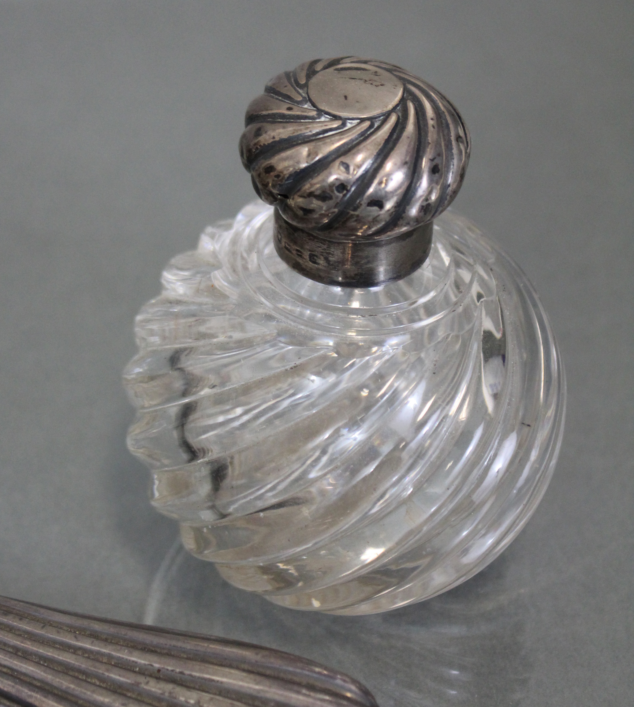 A silver-mounted perfume bottle; a silver-backed hand mirror & similar shoe-horn; & a soft brush - Image 2 of 2