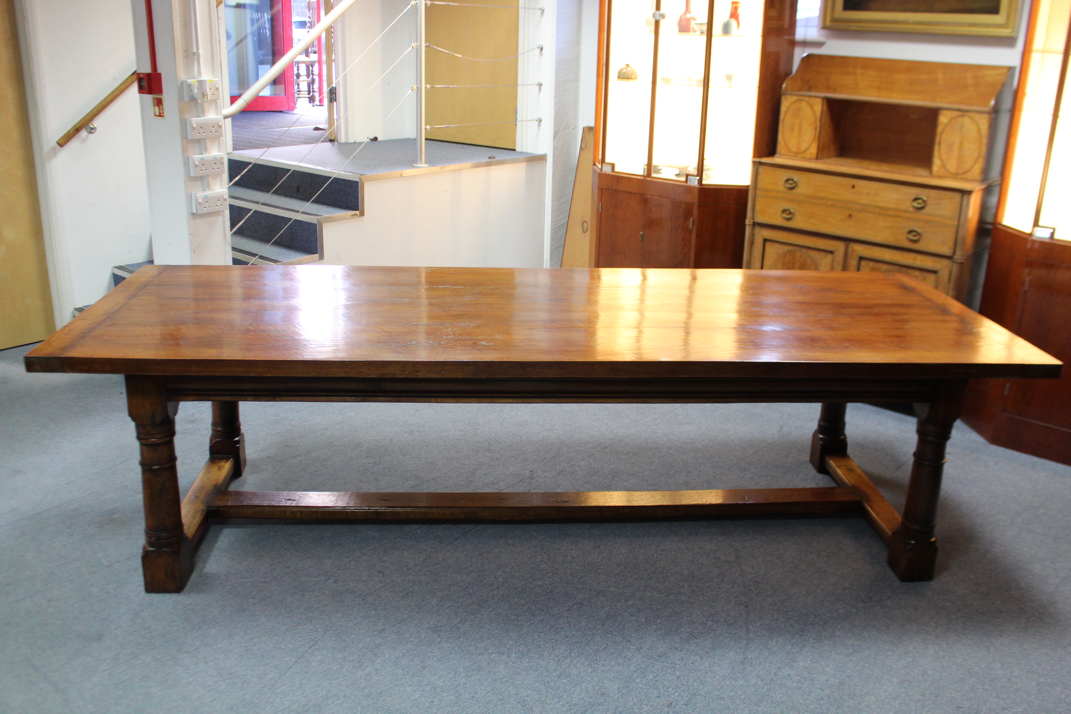 A LARGE 17th century STYLE OAK REFECTORY TABLE, the plain rectangular top with cleated ends above - Image 6 of 6