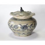 An early Chinese blue & white small jar & cover, the squat round body painted with a band of