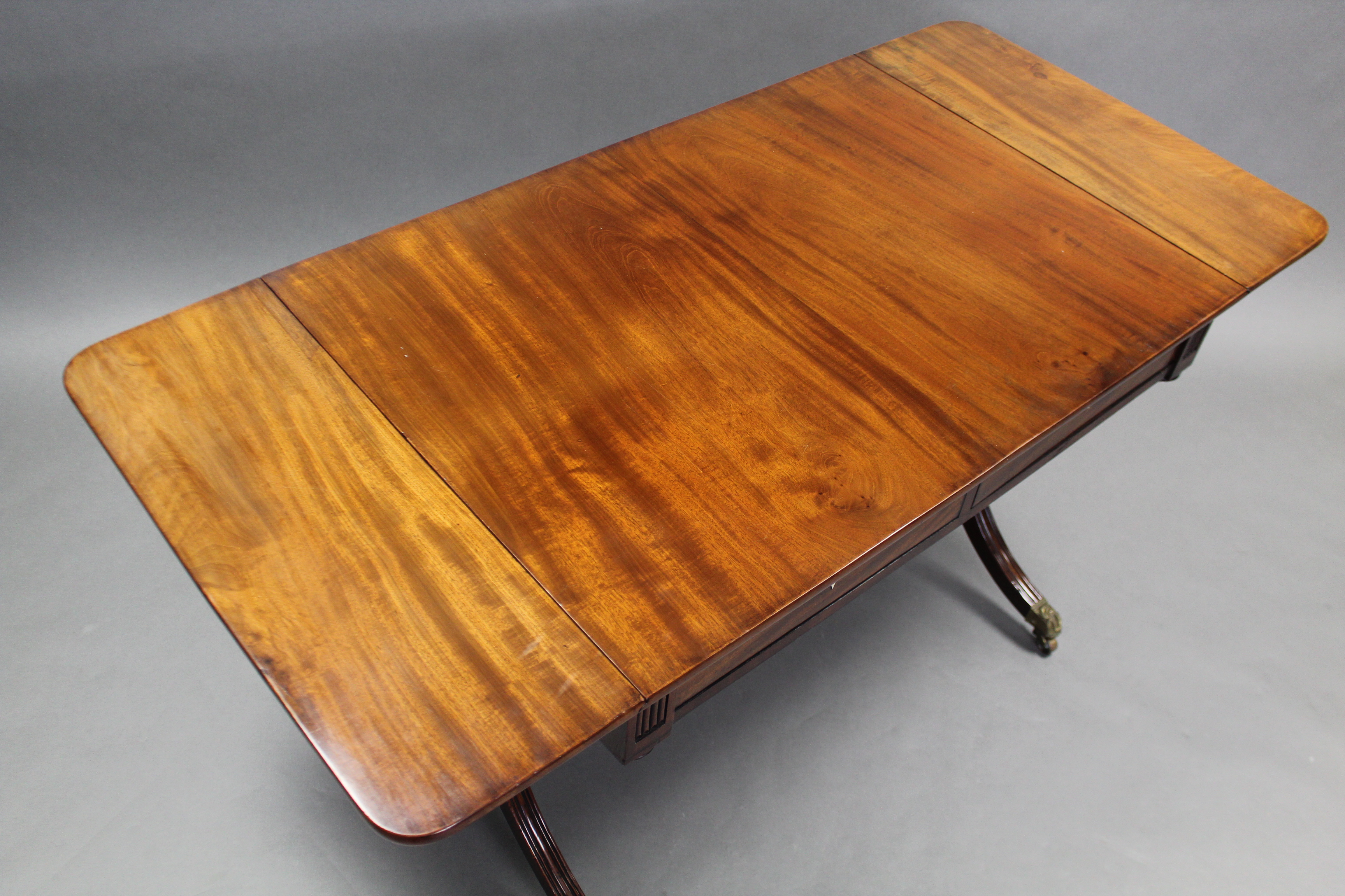 A REGENCY INLAID MAHOGANY SOFA TABLE, the rectangular top with rounded ends to the drop-leaves, - Image 2 of 2