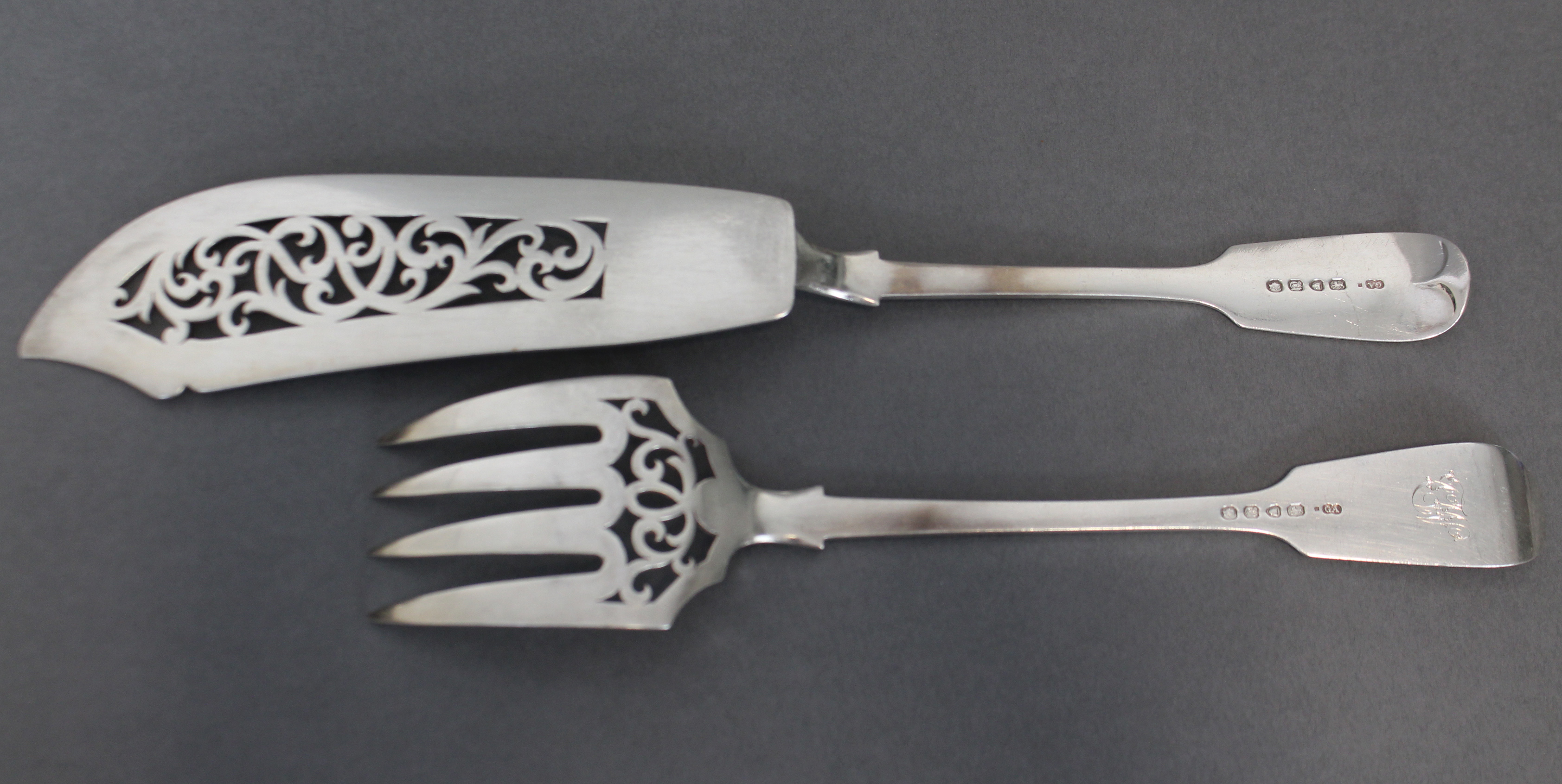 A pair of Victorian silver Fiddle pattern fish servers with pierced scroll decoration, London - Image 2 of 2