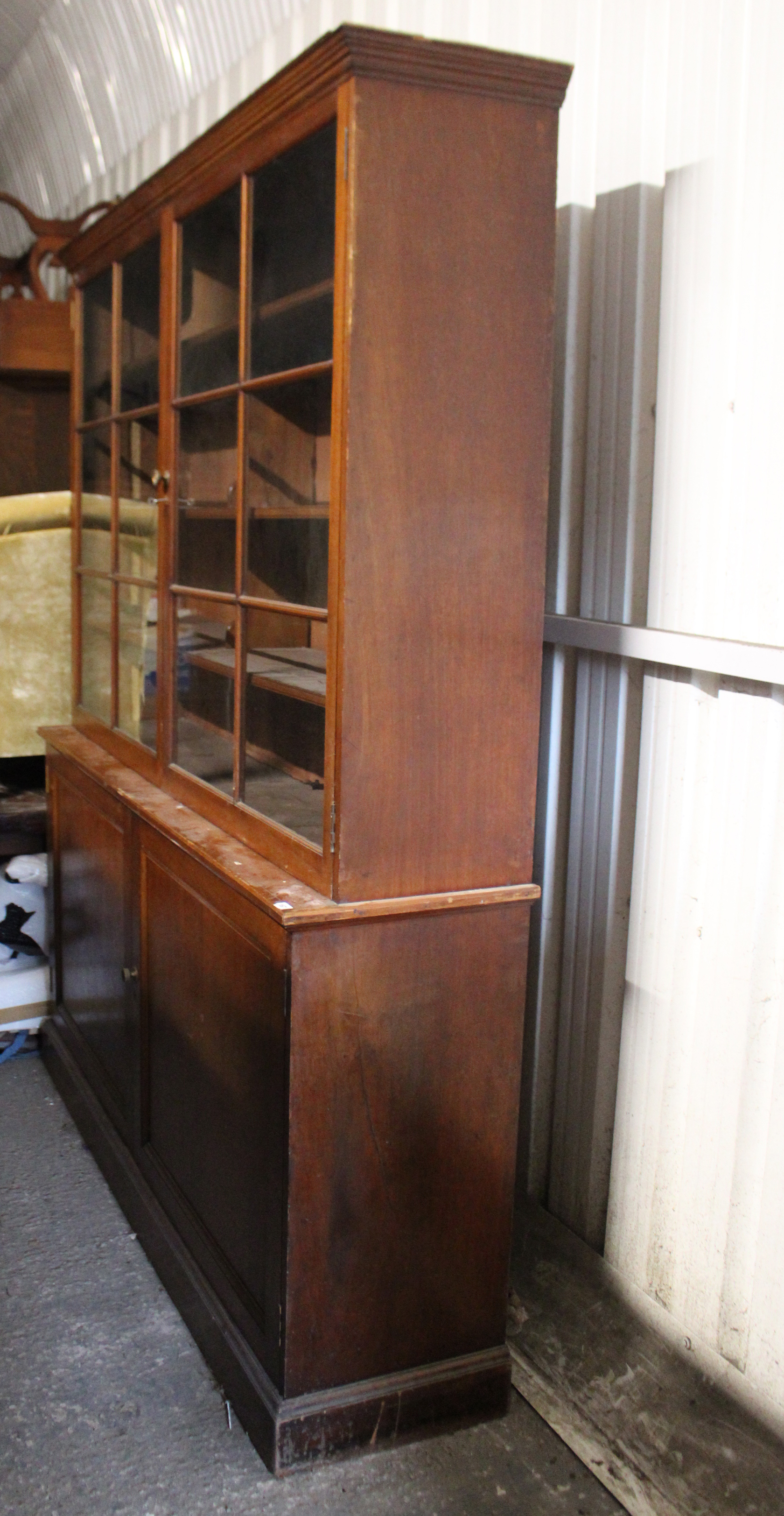 AN EARLY VICTORIAN MAHOGANY BOOKCASE, with moulded cornice above four graduated shelves enclosed - Image 6 of 10