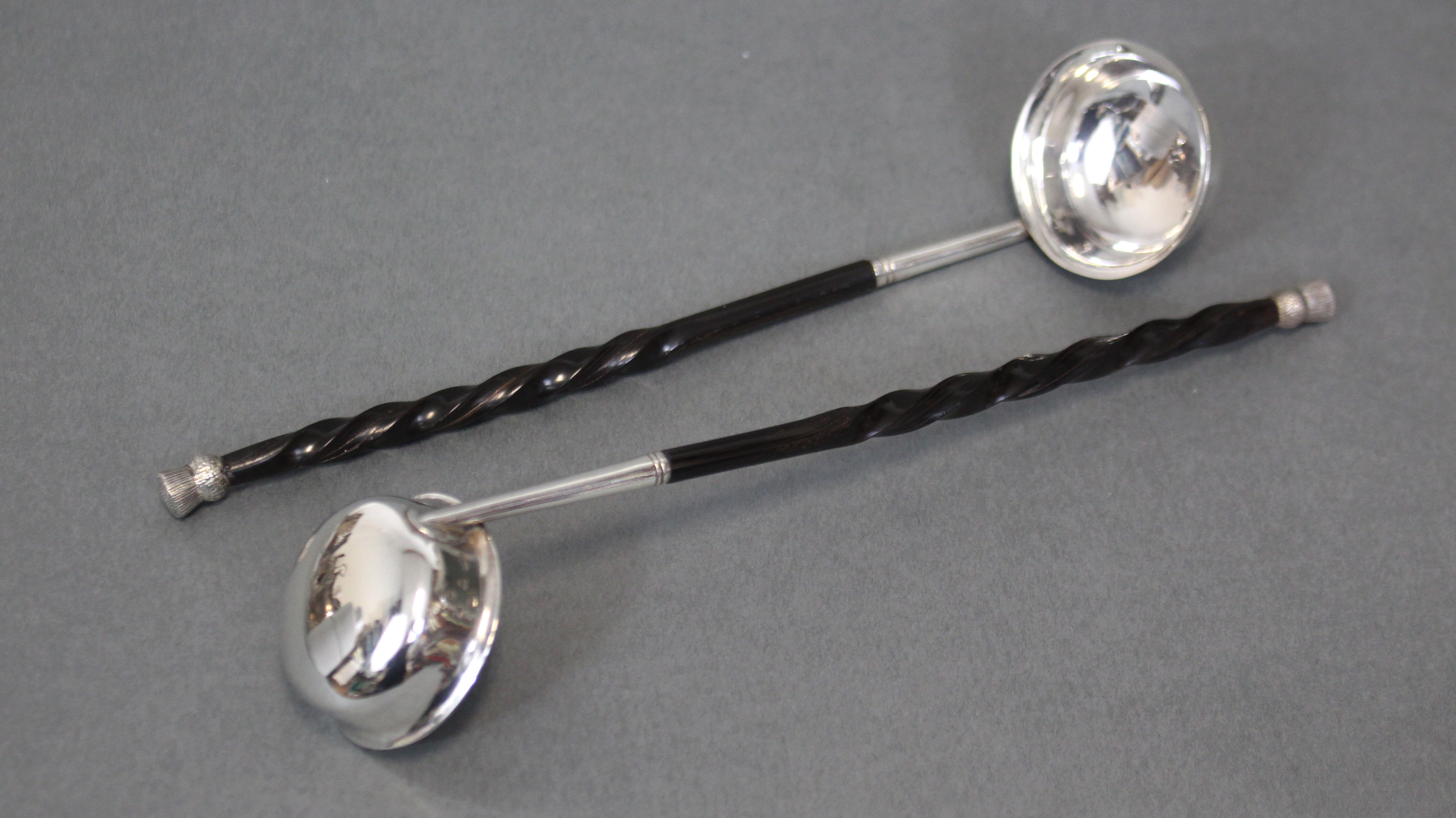 A SET OF SIX VICTORIAN SILVER TODDY LADLES with small round bowls & thistle terminals to the - Image 4 of 6