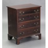 A 19th century mahogany small chest, fitted four long graduated drawers with brass swan-neck