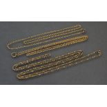A 15ct. gold fine-link chain necklet, 19” long (5.7gm); a yellow metal longchain, the ring-bold