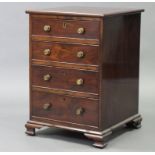 A Georgian mahogany chest of small proportions, fitted four long graduated drawers with brass knob