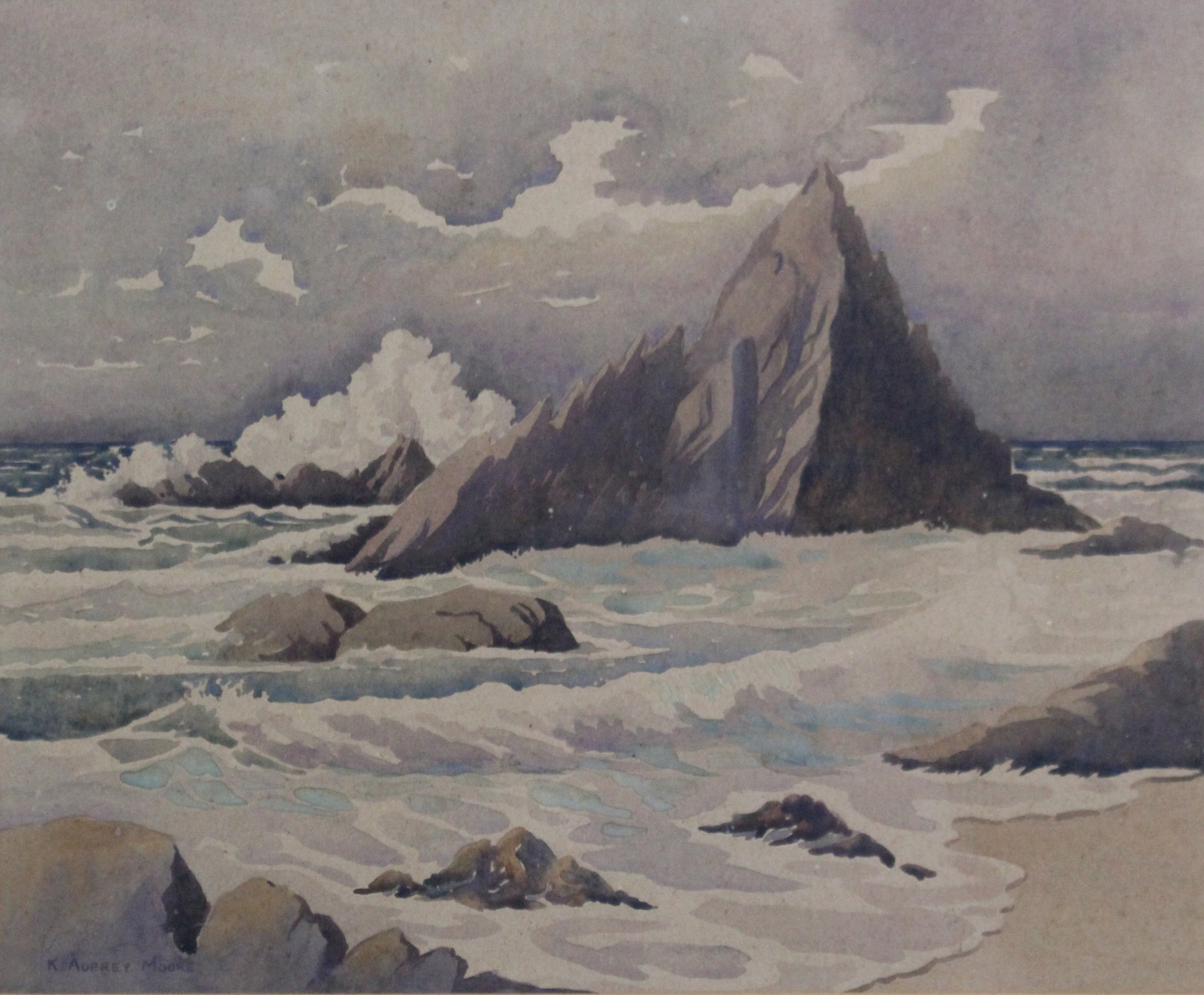 K. AUBREY MOORE (British, 20th century). A rocky outcrop in rough seas, possibly Cornwall. Signed