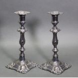 A pair of Elkington & Co. silver plated candlesticks in the mid-18th century style, each with