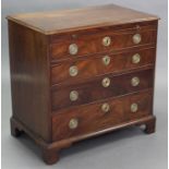 An 18th century mahogany chest with moulded edge to the rectangular top, fitted brushing slide above