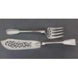 A pair of Victorian silver Fiddle pattern fish servers with pierced scroll decoration, London