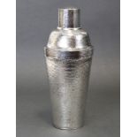 A Japanese silver cocktail shaker of conventional form with all-over planished surface, 8¾” high. (