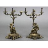 A pair of 19th century ormolu candelabra with foliate scroll branches on figural stems & rococo scr