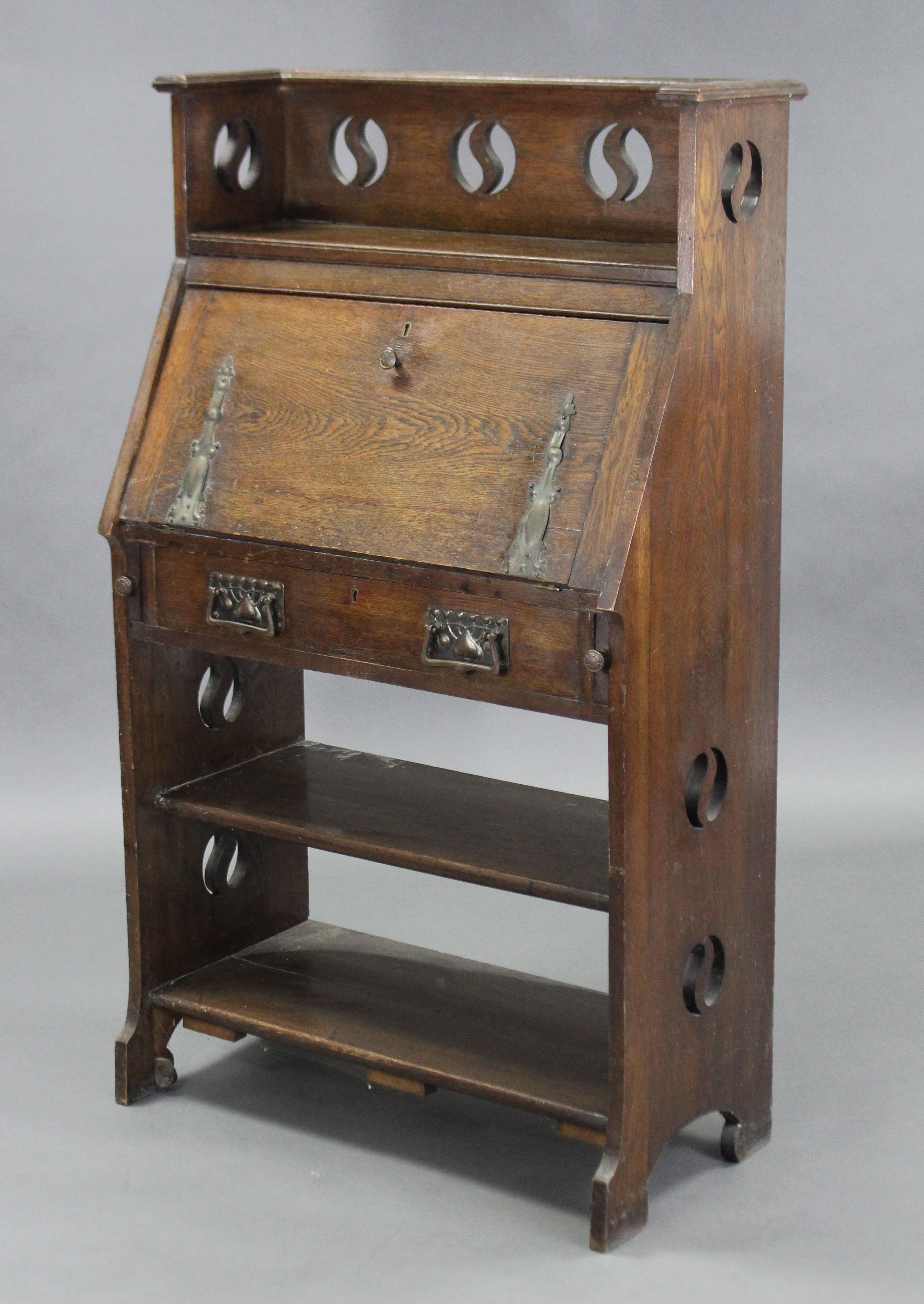 An Arts & Crafts oak upright hall cabinet, with pierced roundels to the tray top & sides, a - Image 3 of 6