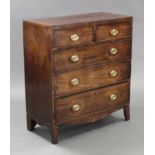 A Georgian inlaid mahogany chest, fitted two short & three long graduated drawers with brass oval