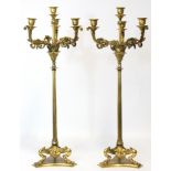 A PAIR OF LARGE GILT-BRASS GRECIAN STYLE TABLE CANDELABRA by ELKINGTON & Co., each with pierced