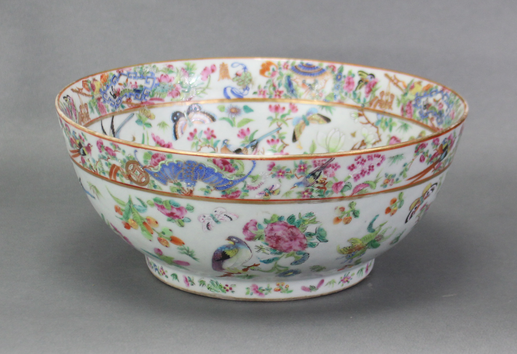 A 19th century Cantonese porcelain punch bowl, of celadon ground & with all-over famille rose - Image 5 of 7