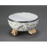 An early 20th century German porcelain bowl with silver-plated rim marked “WMFN”, the sides