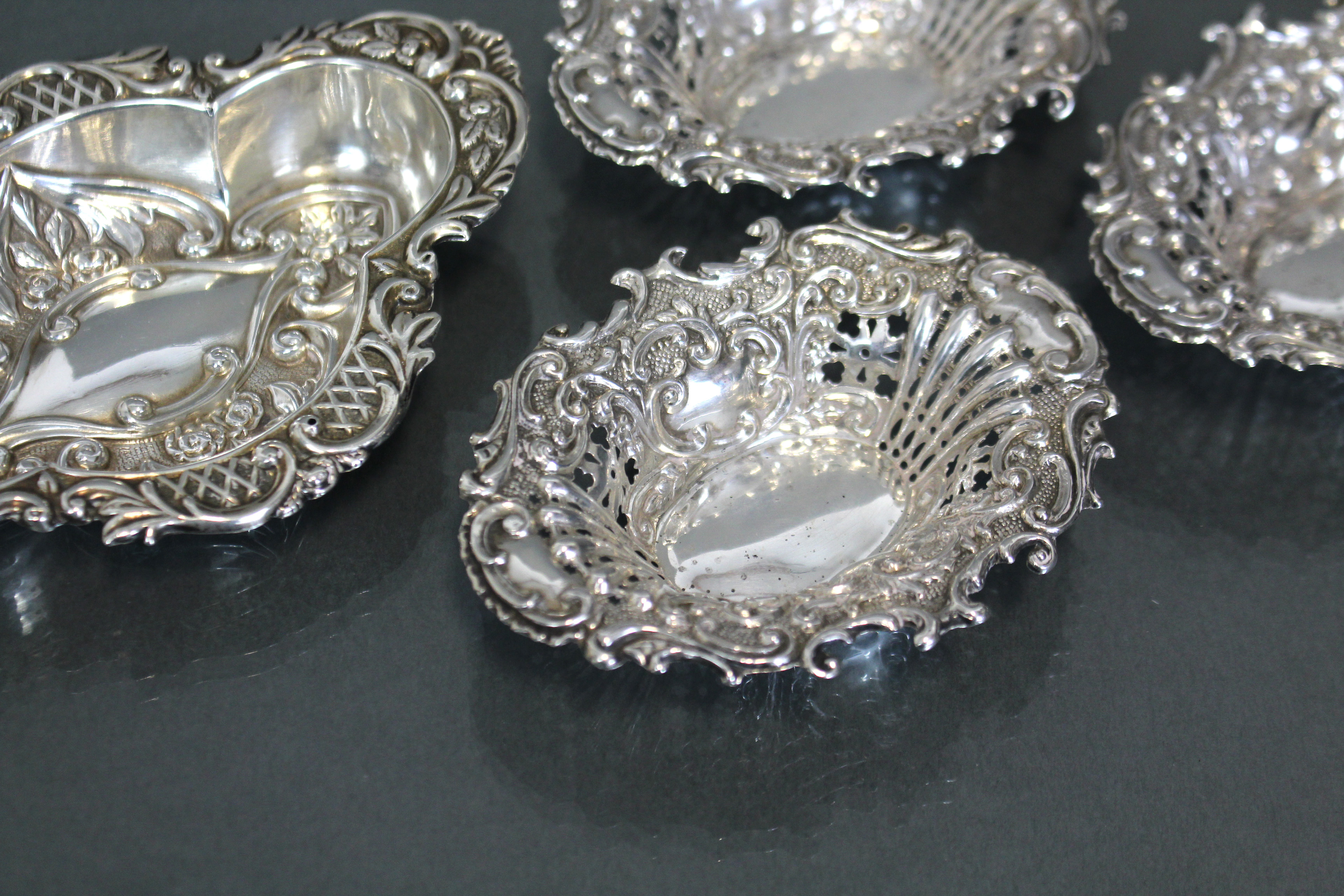 A George V silver quatre-lobe small oval dish with embossed decoration of flowers & scrolls, - Image 3 of 5