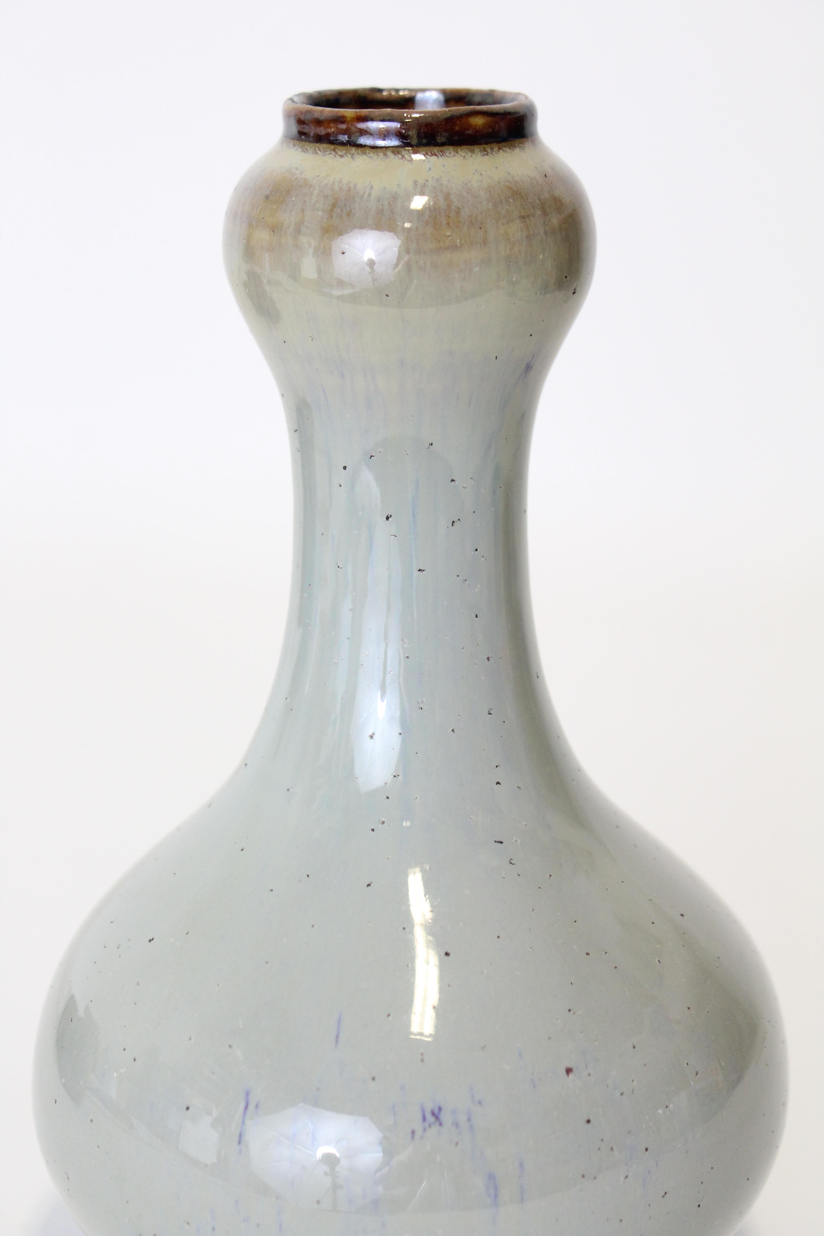 A CHINSE FLAMBÉ-GLAZED “GARLIC-MOUTH” VASE, the glaze of pale bluish tone, with pear-shaped body & - Image 4 of 10