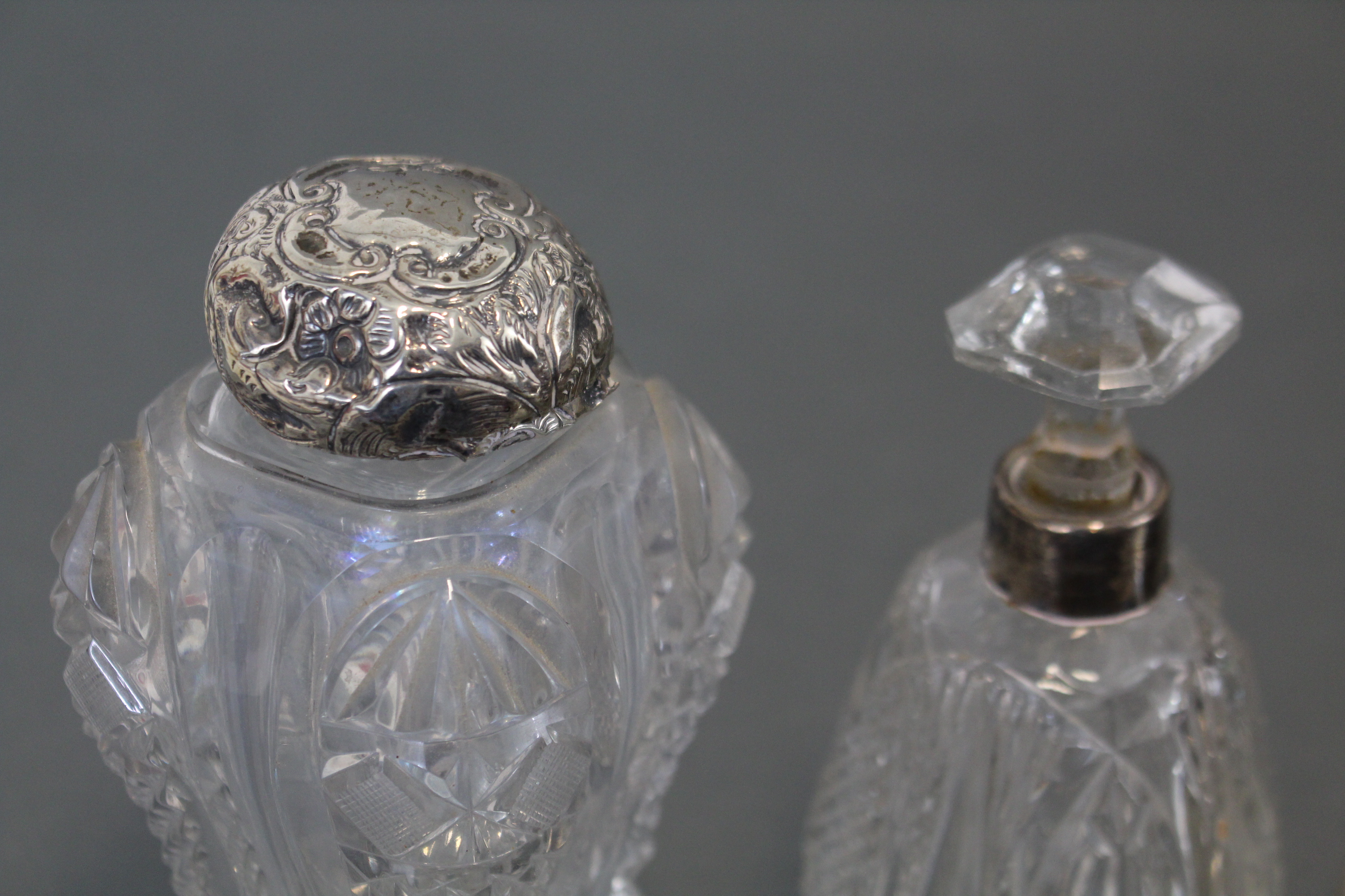 A pair of Edwardian cut glass water bottles with silver lids, London 1903 (w.a.f.); a similar - Image 5 of 5