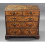 A WILLIAM & MARY WALNUT-VENEERED MARQUETRY CHEST, the quarter-veneered top with moulded edge &