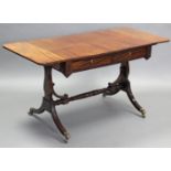 A REGENCY INLAID MAHOGANY SOFA TABLE, the rectangular top with rounded ends to the drop-leaves,