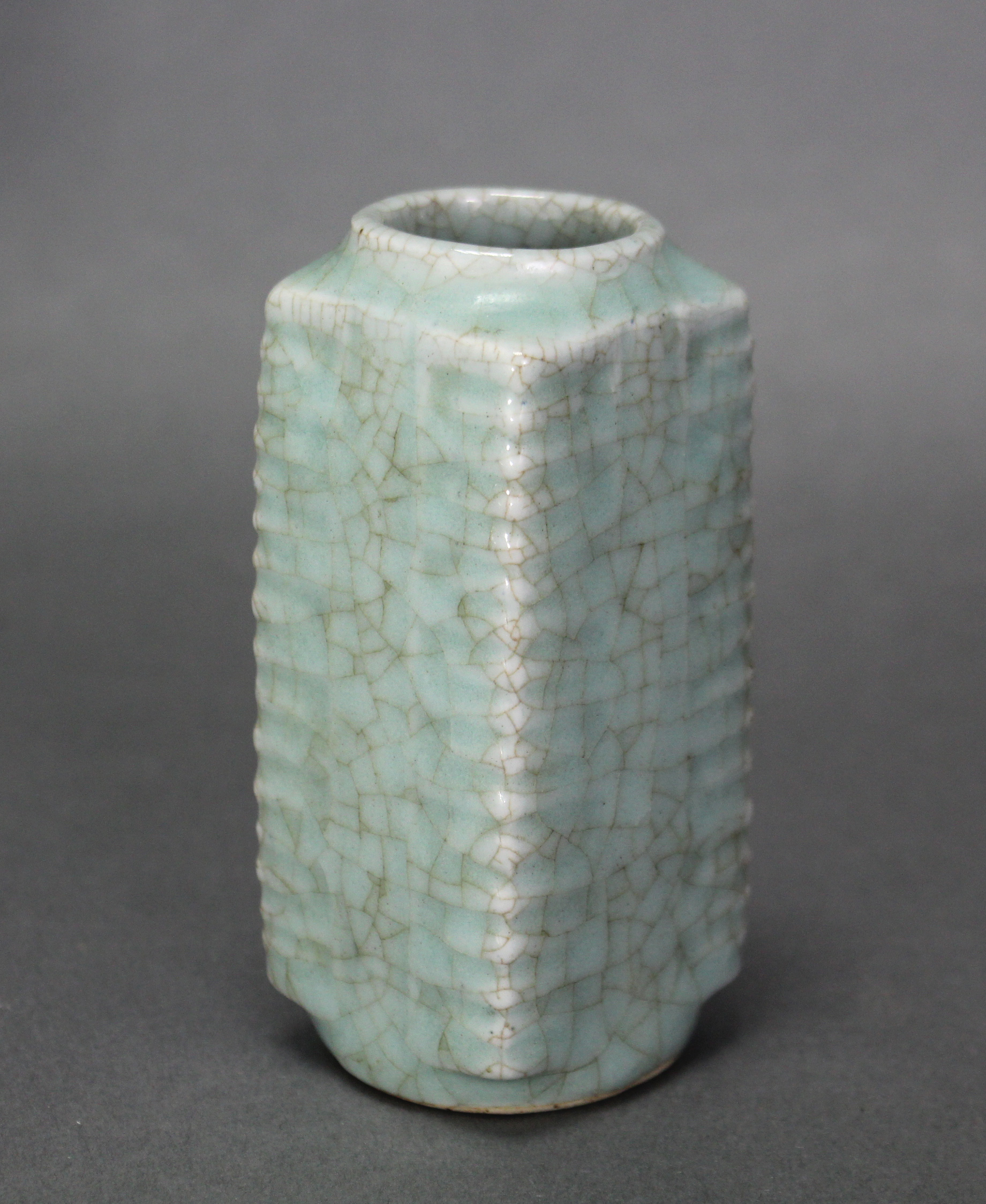 A Chinese porcelain guan-type cong-shaped vase with moulded corners, & pale green crackled glaze; 4”