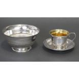 A Victorian silver semi-fluted circular bowl with flared rim, 4¾” diam.; Birmingham 1886, by J.