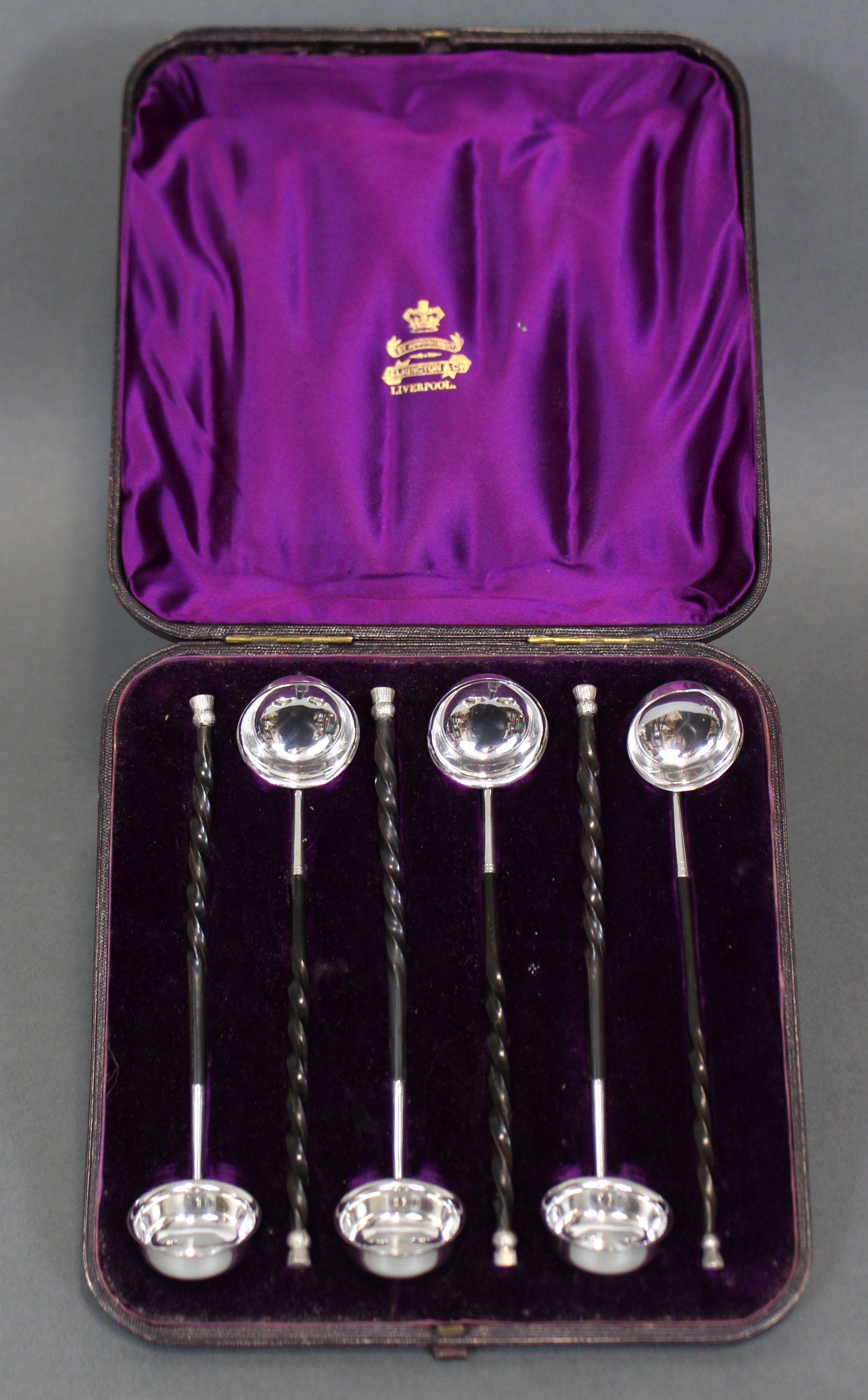 A SET OF SIX VICTORIAN SILVER TODDY LADLES with small round bowls & thistle terminals to the