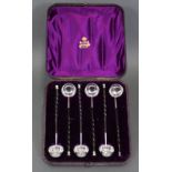 A SET OF SIX VICTORIAN SILVER TODDY LADLES with small round bowls & thistle terminals to the