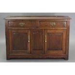 AN 18th century OAK DRESSER BASE, fitted two inlaid frieze drawers with brass swan-neck handles