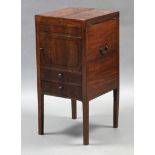 A regency inlaid mahogany washstand with hinged envelope top, fitted a single cupboard door to the