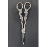 A pair of modern silver grape scissors with cast grapevine stems; London 1969, by D. J. Silver. (3.2