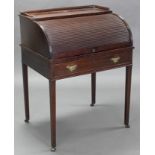 A George III mahogany cylinder-front desk, the fitted interior with slide-out leather writing