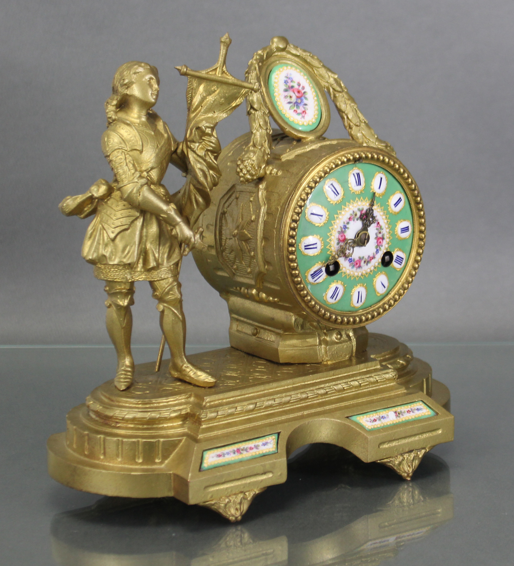 A 19th century French figural mantel clock by Brevet, the 3” green enamel dial with floral - Image 2 of 3