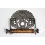 A reproduction “G. W. R.” toilet roll holder, 7½” wide.