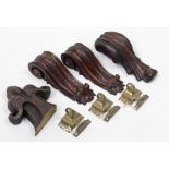 Four carved wooden appliques; & three brass furniture fittings.