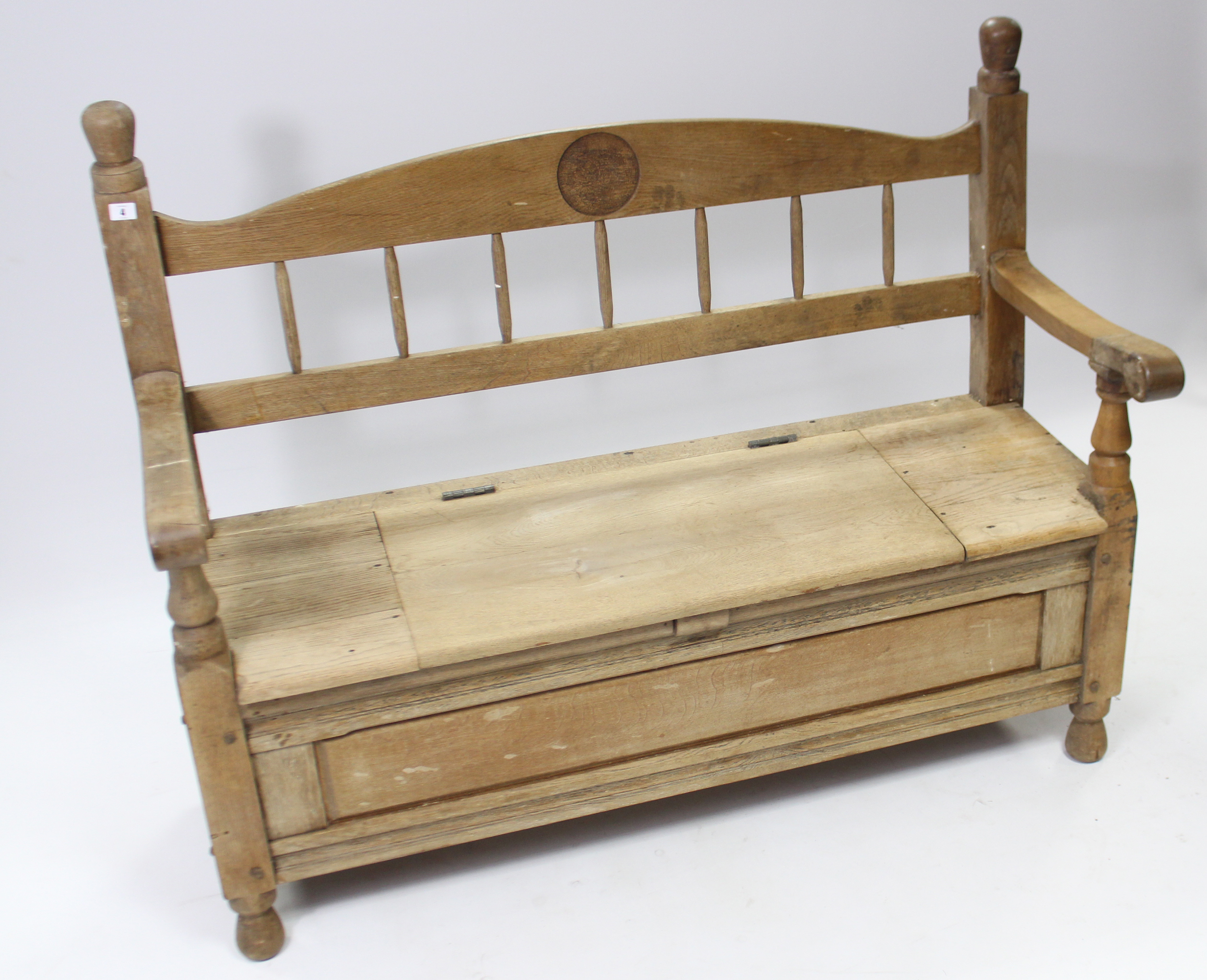 A light oak hall bench with spindle-rail to the back, with hinged lift-seat, panelled front & sides, - Image 2 of 3