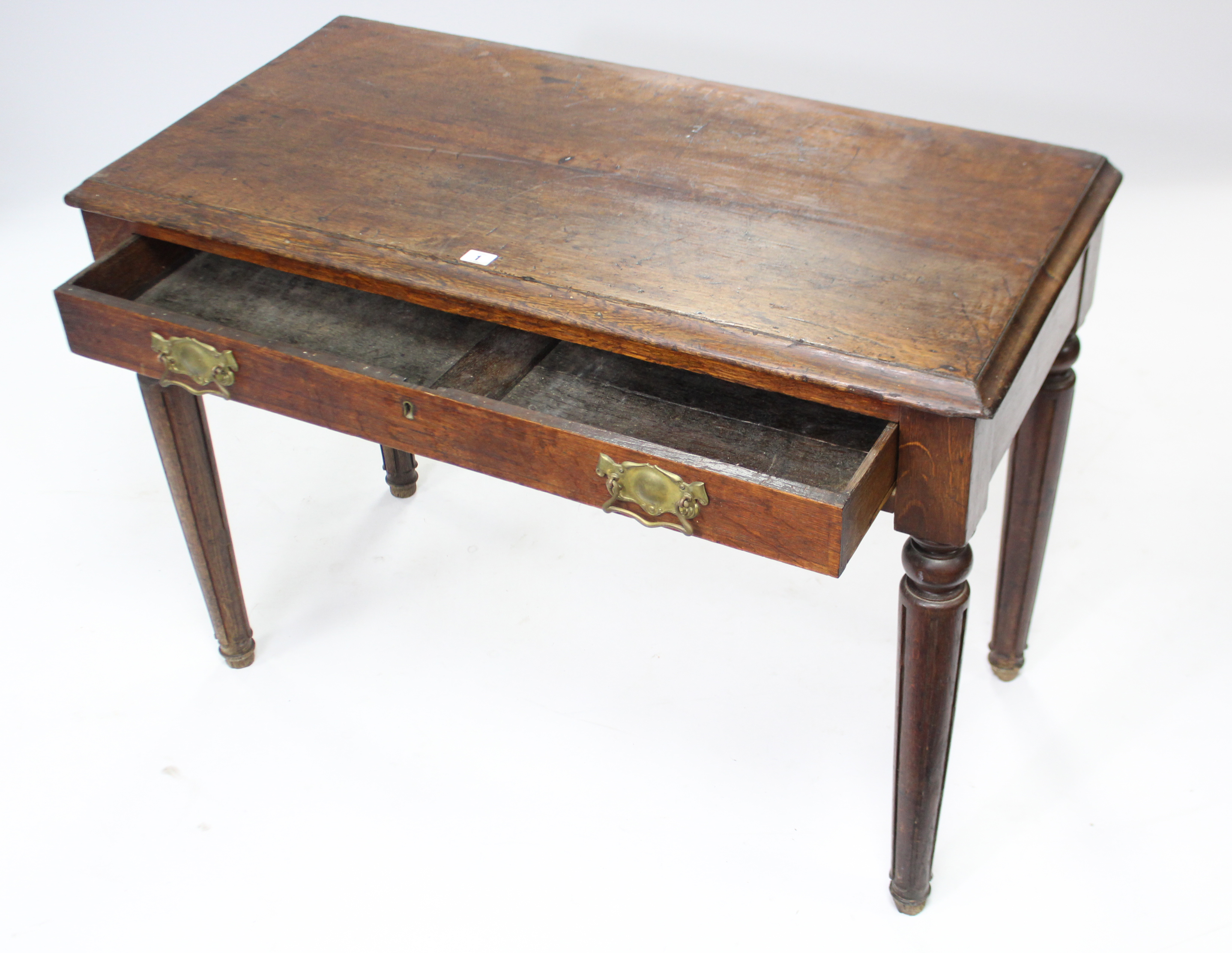 A late Victorian oak side table with moulded edge to the rectangular top, fitted frieze drawer, & on - Image 2 of 2