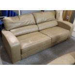 A tan leather three seater settee, 65” long; & a ditto two-seater settee, 84” long.